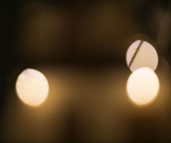 Luminous shapes suggesting flexibility and inner glow